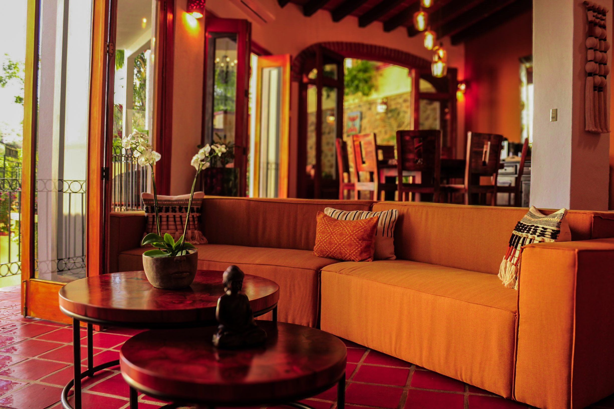 Cozy living room with warm lighting and comfortable seating.